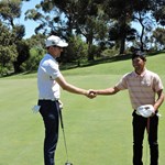 Corey Fawkes congratulates club champion Chantha Kong